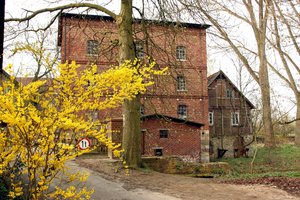 Mühle Tüchter mit historischem Wappenstein von 1689 – Familieneigentum seit 1865